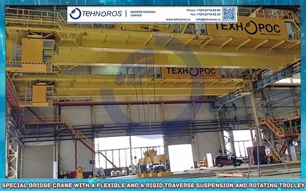 Special bridge crane with a flexible  and a rigid traverse suspension and rotating trolley